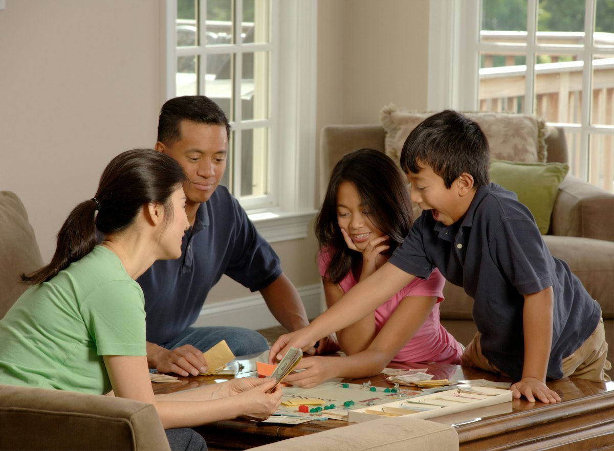 A family playing a board game together